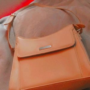 Liz Claiborne bag,all sizes,tan with cute blue inside,used once